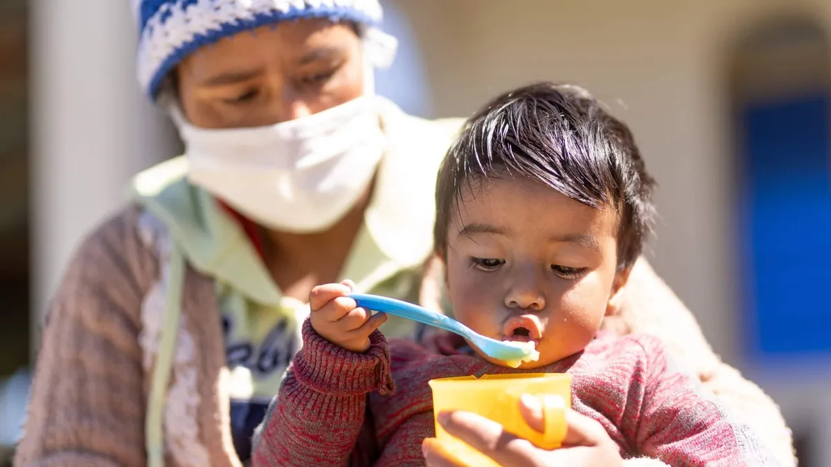 Creating Synergies Between Poverty and Nutrition: A Key to Addressing Child Malnutrition
